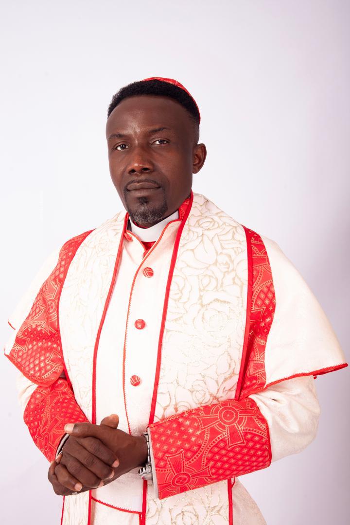 Portrait of Apostle Isaac Adjei in ceremonial attire
